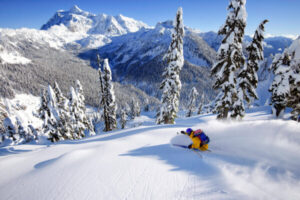 person skiing down a mountain